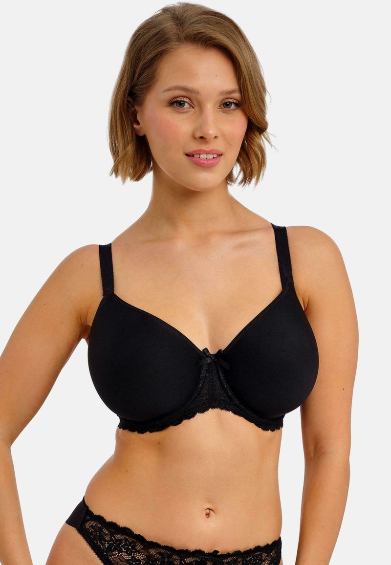 Schwarzer BH mit gepolsterten Cups, verstellbaren Trägern, Spitzenbesatz und einer kleinen Schleife in der Mitte. Glatte Textur, für Halt konzipiert.