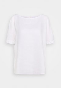 Valkoinen pellavapaita, jossa on lyhyet hihat, venepääntie, rento malli ja vyötärölle ulottuva helma, joka sisältää hienovaraisen tekstuurin.