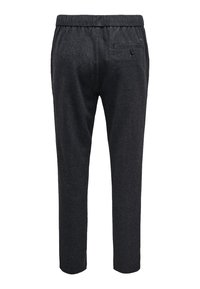 Dark grey tapered trousers with an elastic waistband, textured fabric, and a single back pocket featuring a button closure.