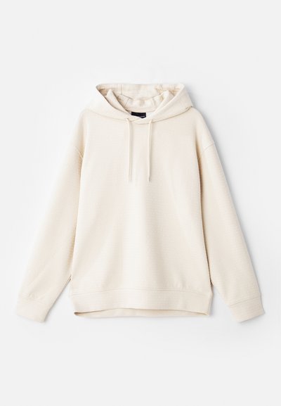 Felpa beige con un motivo testurizzato, cappuccio con cordoncino e maniche lunghe. Presenta una vestibilità rilassata e polsini e orlo a costine.