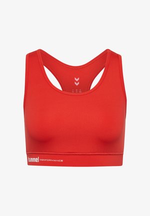 Rode sportbh met een ronde hals en racerback ontwerp. Gemaakt van gladde stof met een witte "hummel PERFORMANCE" logo aan de onderzijde.