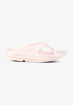 Light pink flip-flop sandals with a rubber upper, textured footbed, and minimalistic design featuring a toe post and cutouts for breathability.