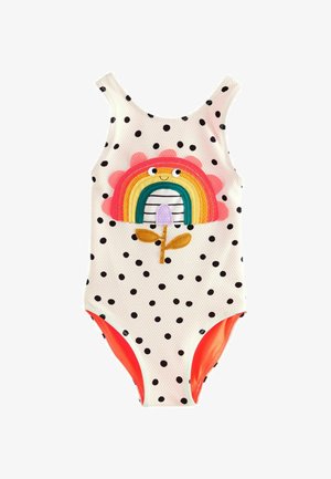 Maillot de bain une pièce à pois blancs, avec un motif coloré de rainbow et de fleurs. Accents orange aux ouvertures des jambes. Tissu texturé.