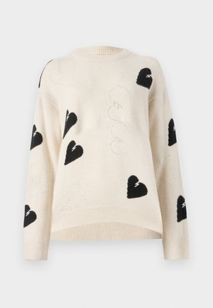 Light beige knit sweater featuring black heart patterns and silver thread accents. Round neck and ribbed hem with loose-fit sleeves.
