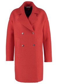 Rode dubbelbreasted jas van gestructureerde stof, met een gelapte kraag, twee frontzakken en zilveren knoopaccenten.