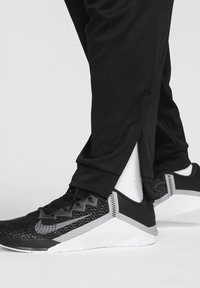 Nike Performance - Spodnie treningowe