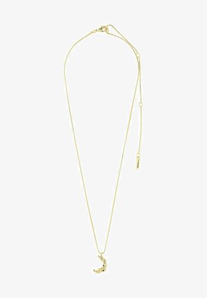 Collana d'oro con una delicata catena e un pendente a forma di mezzaluna, caratterizzato da dettagli incisi e da una piccola pietra colorata.