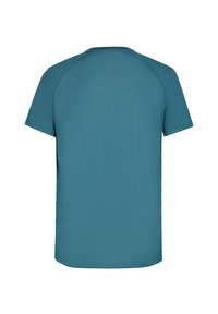 Teal sportströja, korta ärmar, lättviktsmaterial, rundad halsringning, sömlös axeldesign, mjuk textur, minimalistisk stil.