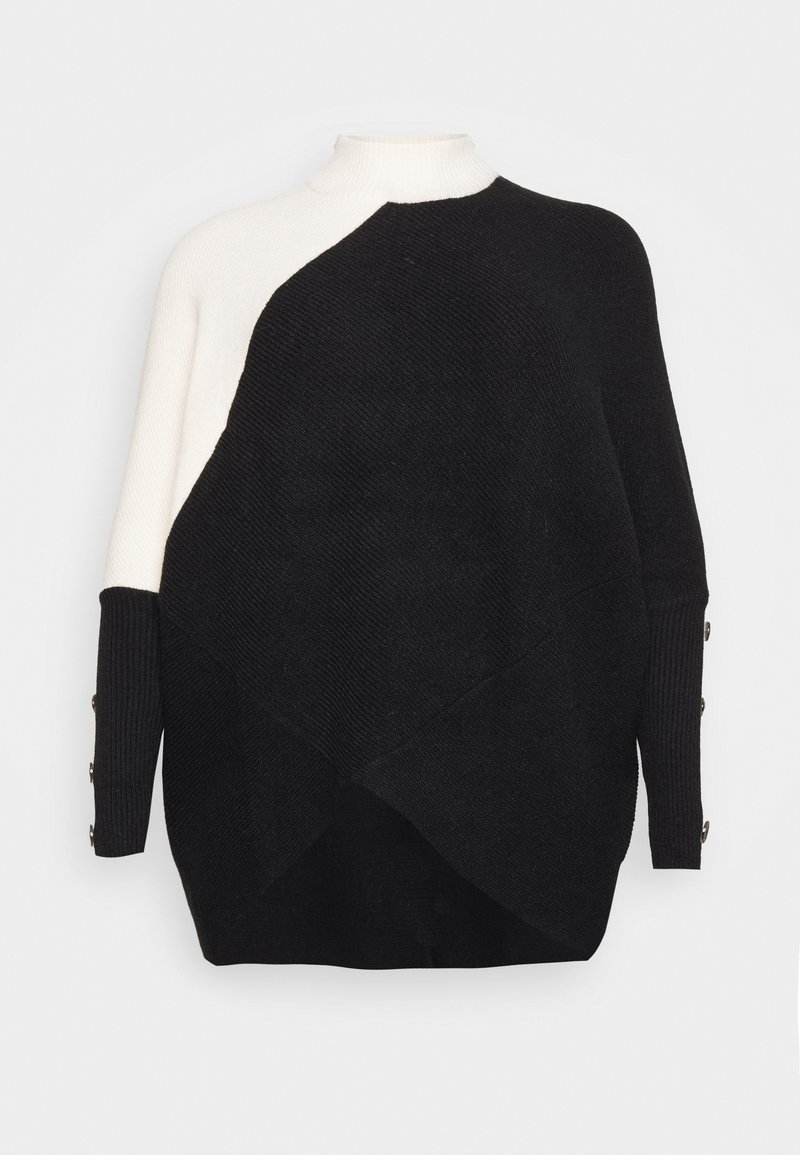 Maglione a collo alto bianco e nero con design asimmetrico, maglia testurizzata e dettagli con bottoni sulle maniche. Vestibilità ampia e orlo inclinato.
