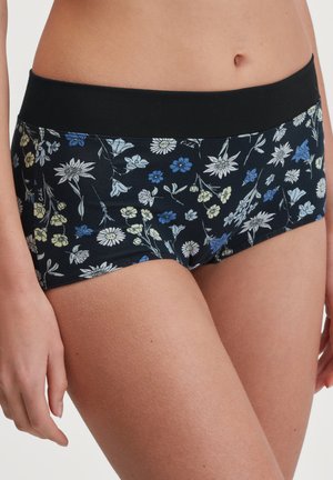 Zwarte katoenen shorts met bloemenprint en een zachte, brede tailleband. Bevat blauwe, witte en gele bloemen op een donkere achtergrond. Soepele textuur.