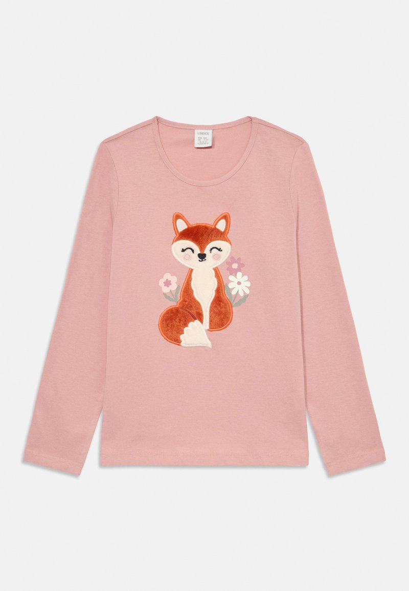 Maglietta a maniche lunghe rosa con una grafica di una volpe sorridente seduta tra tre fiori pastello sul davanti.
