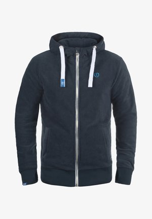 Fleece zip-up hoodie in dark navy with white drawstrings. Features two front pockets and ribbed cuffs. Small logo on the chest.