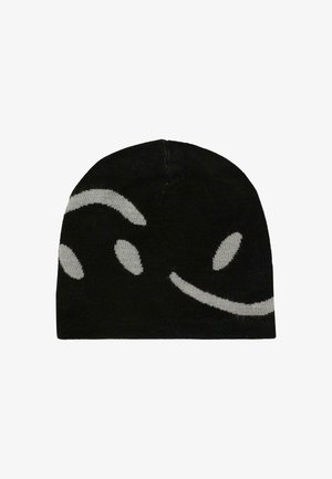 Cappello in maglia nera con forme grigie curve e ovali astratte lavorate nel tessuto.