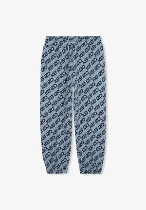 Hellblaue Jogginghose mit schwarzem, wiederholendem KENZO-Logo-Muster. Elastischer Bund mit Kordelzug und elastischen Bündchen an den Knöcheln.