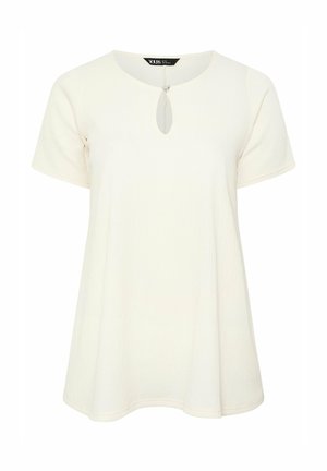 Weißes kurzärmeliges, strukturiertes Oberteil mit rundem Ausschnitt und herzförmigem Ausschnittdetail in der vorderen Mitte.