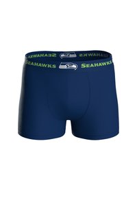 Boxer breves azul marino con una cinturilla de logo de los Seahawks en verde y azul. Textura suave con un diseño ajustado y sin costuras visibles.