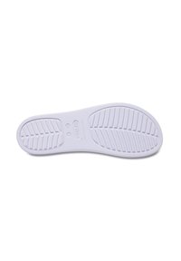 Witte rubberen schoenzool met een gestructureerd patroon, voorzien van groeven voor grip en een reliëflogo. Vlakke vorm met afgeronde randen.