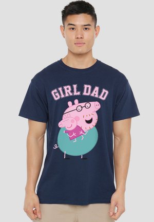 Navy cotton t-shirt featuring "GIRL DAD" in pink text, with a cartoon pig character and child, both in pink and teal accents.