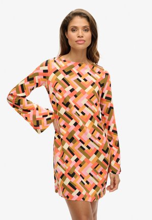 Long-sleeve dress featuring a geometric pattern in pink, orange, black, and brown. Made from a smooth fabric with a relaxed fit.