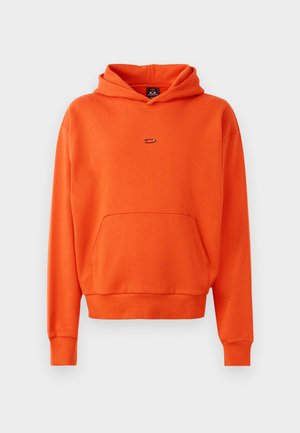Orange hoodie made of soft material, featuring a kangaroo pocket, ribbed cuffs, and a small logo on the chest.