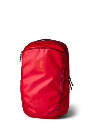 Red Cotopaxi branded backpack with zippered compartments and a top handle against a white background.
