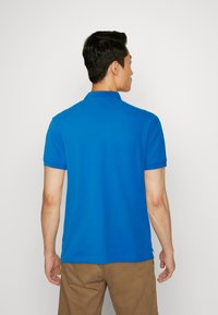 Tommy Hilfiger REGULAR - Polokošeľa - shocking blue