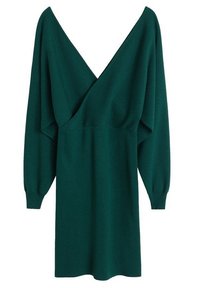 Robe tricotée verte avec de longues manches bouffantes et un décolleté en V profond. Le design présente une taille cintrée et descend jusqu'à un ourlet au niveau du genou.