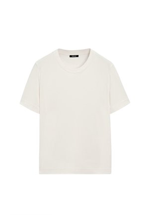 Short-sleeved t-shirt in light cream color, made of soft cotton. Features a round neckline and a simple, straight-cut design.