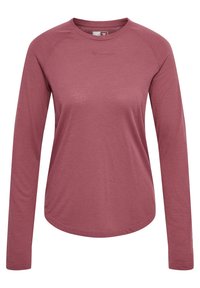 Pitkähihainen urheilupaita hillityssä ruusunsävyssä, valmistettu teksturoidusta, hengittävästä kankaasta. Siinä on pyöristetty helma ja raglanselät.