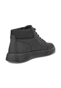 Black mid-top sneakers made of synthetic material, featuring a textured panel, rubber sole, and contrasting mesh accent at the ankle.