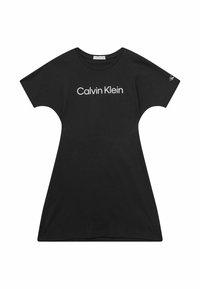 Černé bavlněné šaty ve tvaru tuniky s oversized rukávy a bílým logem "Calvin Klein" na hrudi.