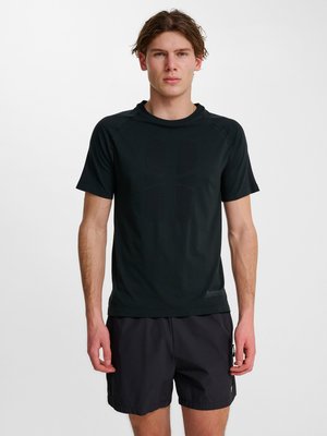 Hummel, HMLHIIT SEAMLESS - Sport T-Shirt - black