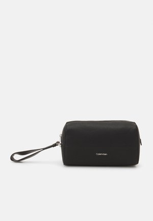 Calvin Klein MINIMALISM WASHBAG UNISEX - Kosmetyczka