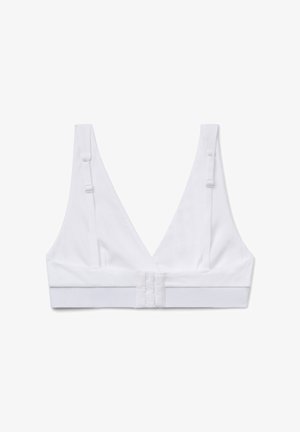 Bílá, měkká tkaninová braletka s hlubokým V-výstřihem, nastavitelné ramínka a zapínání na háček a oko na spodní straně. Minimalistický design.