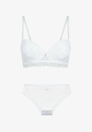 White lace bra and matching panties with floral pattern, gold accents, adjustable straps, and scalloped edges. Soft texture and delicate design.