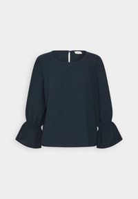 Blouse noire à manches longues avec col rond, poignets élastiqués et évasés, et petite fermeture éclair au dos.