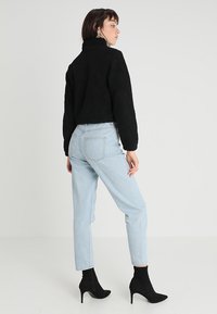 Urban Classics LADIES SHORT SHERPA TROYER - Flisinis džemperis - black