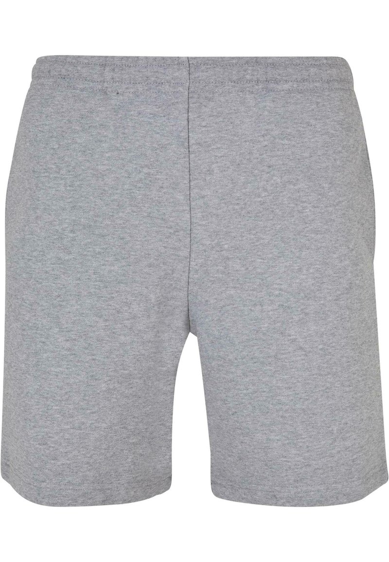 Shorts en coton gris avec une texture douce, une taille élastique et un design simple. Coupe classique avec une longueur mi-cuisse et sans poches visibles.