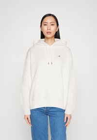 GANT - SHIELD HOODIE - Pulover s kapuco - eggshell Miniaturna slika 1