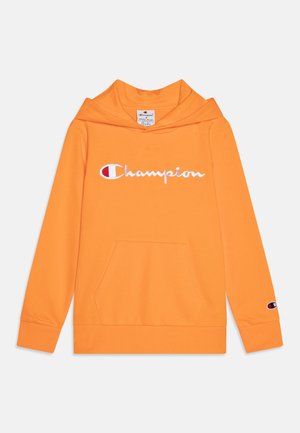 Felpa arancione in cotone con tasca frontale, caratterizzata da un logo "Champion" ricamato in bianco sul petto e logo sul maniche.