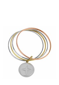 Set of four bangles in silver, gold, rose gold, and textured designs, featuring a round pendant with a star motif.