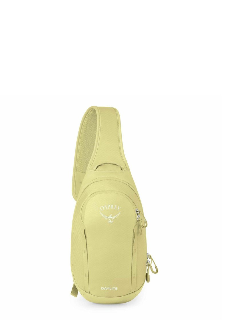 Zaino a tracolla Osprey Daylite di colore verde chiaro con spallaccio imbottito e numerosi scomparti con zip.