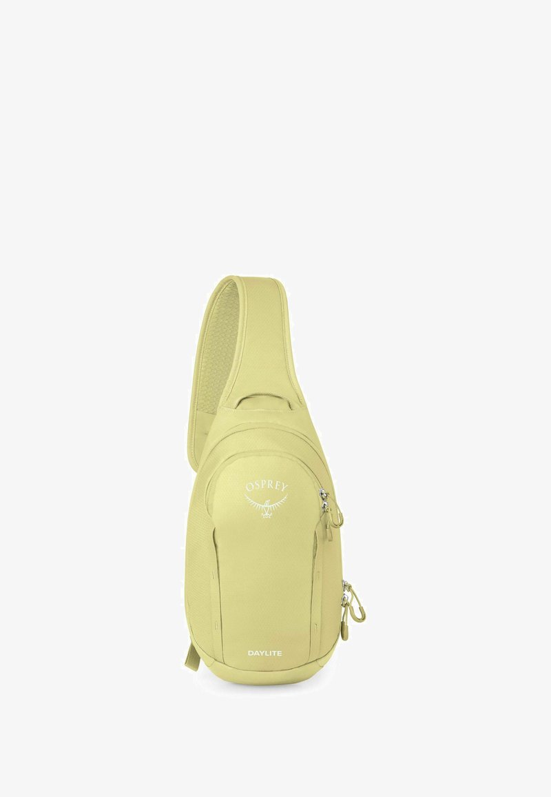 Zaino a tracolla Osprey Daylite di colore verde chiaro con spallaccio imbottito e numerosi scomparti con zip.