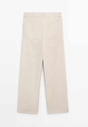 Pantaloni in corduroy beige con design a gamba dritta, dotati di due tasche posteriori e sottile texture a coste.