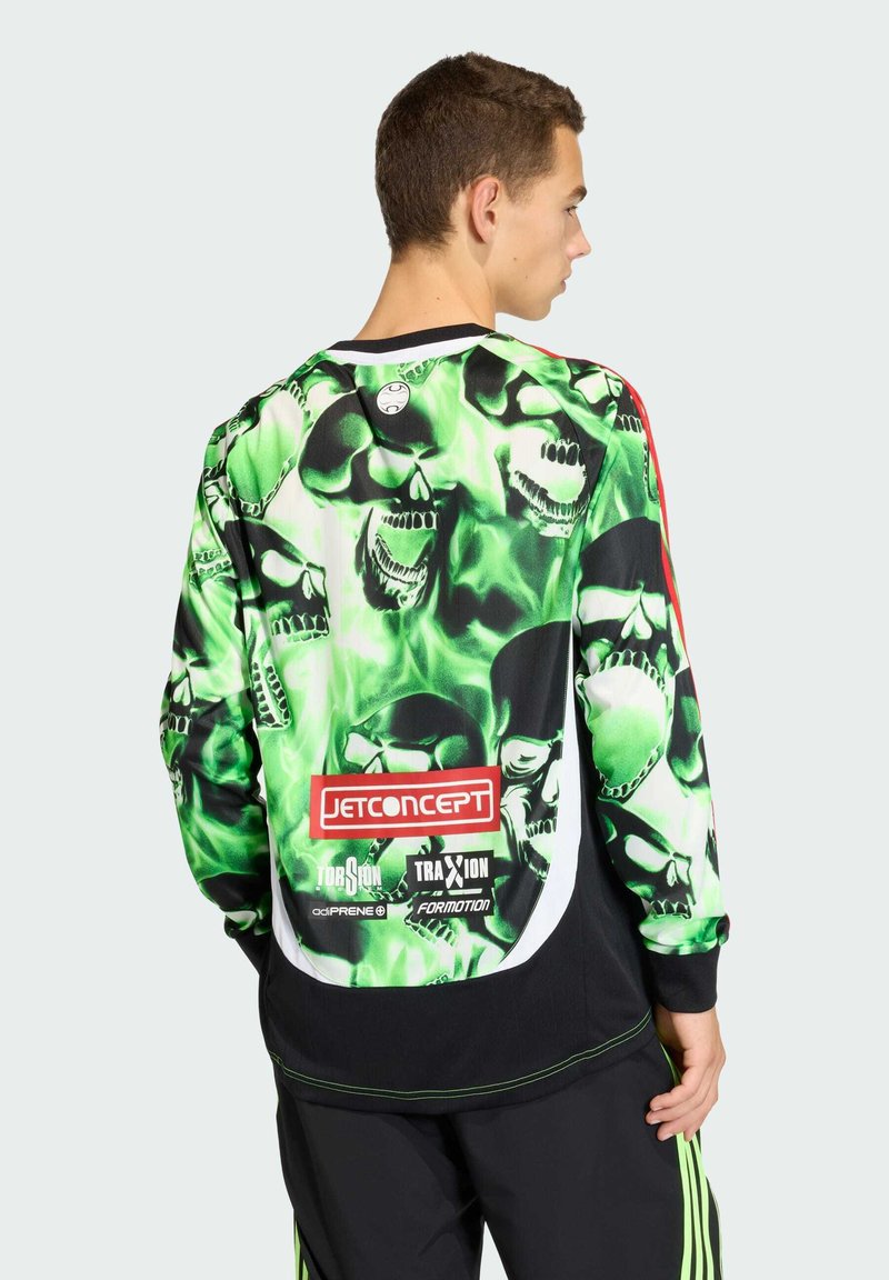 Langermige shirt met een levendig groen en zwart schedelpatter, voorzien van een logo en tekst op de achterkant, gemaakt van een soepele stof.