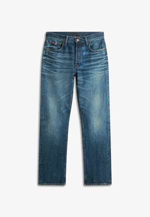 Jeans de mezclilla azul con corte recto, que presentan parches descoloridos, diseño de cinco bolsillos y detalles de costura en contraste.