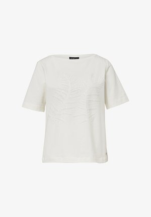 T-shirt blanc à manches courtes en coton, avec un design de feuilles texturé en sequins sur le devant. Encolure arrondie et coupe décontractée.