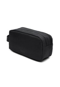 Black rectangular bag with a textured surface, two zipper closures, and a side handle for carrying. Simple design with minimal branding.