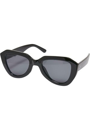 Schwarze Cat-Eye-Sonnenbrille mit glänzender Oberfläche, kantiger Form und dunklen Gläsern. Sie verfügt über dicke Bügel mit subtilen Branding-Details.