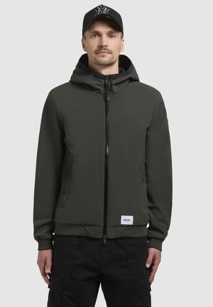 Dark green hooded jacket with a front zipper, elastic cuffs, and a logo patch at the hem, made from a smooth, lightweight material.